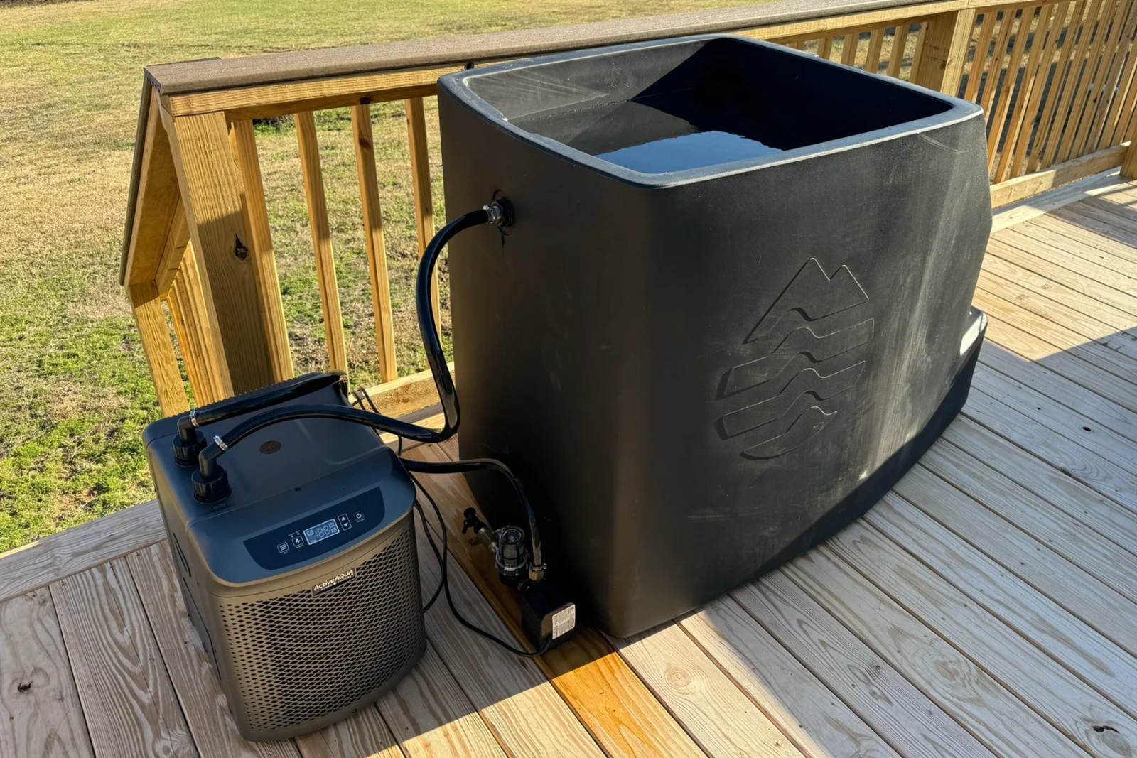 DIY cold plunge setup showing a cold plunge and water chiller.